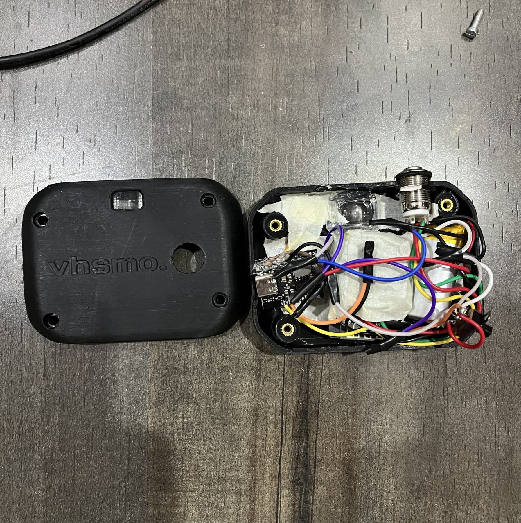 An early 3D-printed VHSMO prototype held together by wires